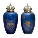 A pair of Chinese small powder blue ground vases, Kangxi period, painted in gilt with butterflies