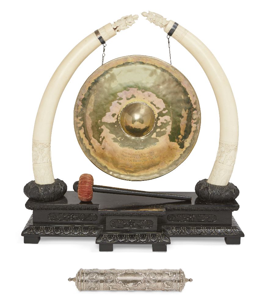 WITHDRAWN An Indian brass and ivory mounted dinner gong, early 20th century, the gong engraved