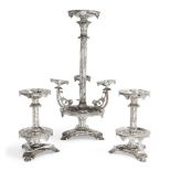 An impressive silver plated three part table centrepiece, comprising: a central ornament designed
