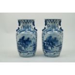 A pair of Chinese porcelain baluster vases, late 20th century, painted in underglaze blue with