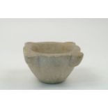 A marble mortar, 20th century, of tapering circular form, with four crescent lugs, 13.5cm x 29.