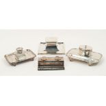 Four silver inkwells/stands, the largest example Birmingham, c.1938, S Blanckensee & Son, of