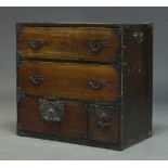 A Japanese elm gentlman's chest, 19th century with two drawers over two short drawers, with cast