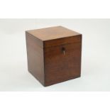 An George III mahogany cellarette, of square form, hinged cover revealing metal lined interior,