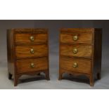 A pair of Regency style mahogany and crossbanded bedside chests, 20th Century, with brushing slide