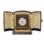 A Zenith travelling alarm clock, early 20th century, of square form, the metal body with enamelled