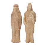 Two Chinese pottery tomb figures, Sui/Tang dynasty, each modelled as standing court officials, one
