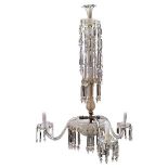 A glass three light chandelier, late 19th/early 20th century, with a tall central baluster stem,