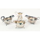 A pair of silver sauce boats, Birmingham, c.1923, S. Blanckensee & Son Ltd., both with scalloped