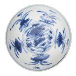 A Chinese porcelain small dish, Kangxi period, painted in underglaze blue with floral blooms