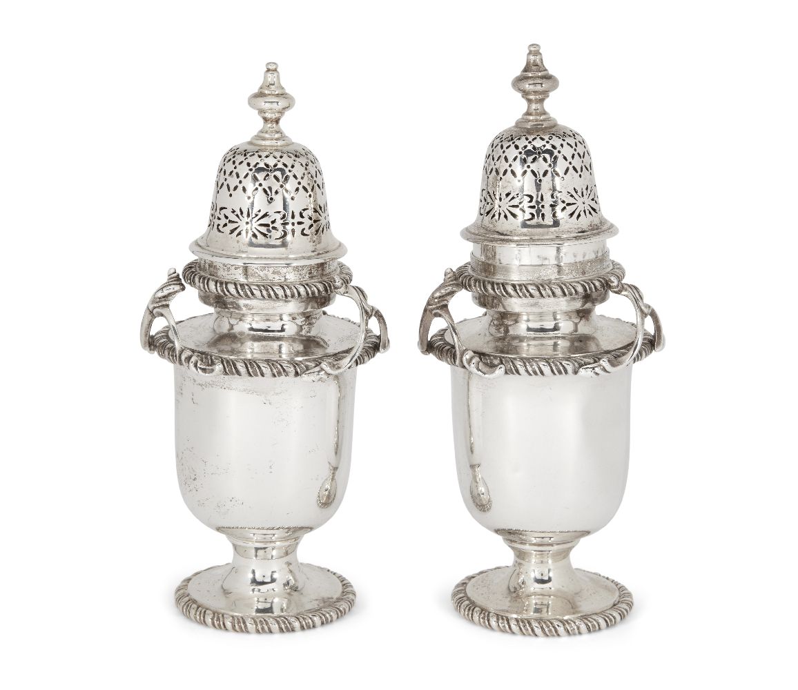 A pair of silver sugar casters, London, c.1899, F B Thomas & Co, each raised on a circular gadrooned