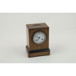 An Edwardian inlaid mantle clock, of rectangular form, wooden body inlaid with scrolling foliate