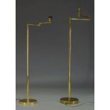 A brass standard lamp, of recent manufacture, with adjustable arm on cylindrical and adjustable stem