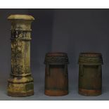 A large clay chimney, 19th Century, of octagonal form, 120cm high, together with a pair of