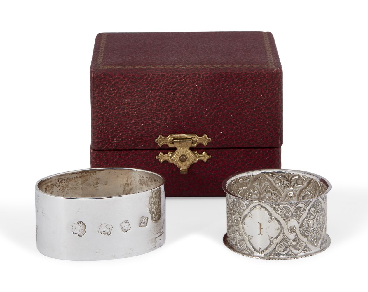 A silver napkin ring in fitted case, London, c.1973, CJ Vander Ltd., of plain flattened oval form, - Image 2 of 2