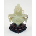 A jadeite carved censer and cover, with carved dragon finial to the cover and dragon form lugs to