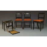 A set of four Regency style black Japanned and parcel gilt dining chairs, late 19th, early 20th