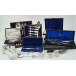 Several sets of silver plated flatware including: a set of twelve each dessert knives and forks with