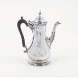 A Georgian silver coffee pot, London, c.1764, W & J Priest, the baluster-shaped body engraved with