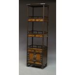 A Chinese elm three tier display stand with brass mounts, 20th Century, with three galleried