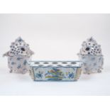 A Delft style ceramic bulb box, late 18th / early 19th century, decorated to the exterior with