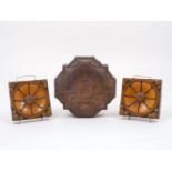 An early Victorian terracotta architectural wall boss of quatrefoil form, the centre shallow