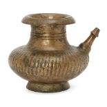 A ribbed brass lota pouring vessel, Deccan, India, 18th century, of typical form, the straight spout