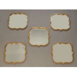 A set of five surtout de table mirrors, 20th Century, each of quatrefoil form, with bevelled