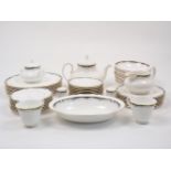 A Royal Doulton 'Rhodes' pattern part service in a setting for eight, late 20th century,