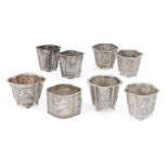Eight various Chinese white metal salts, all stamped TYT, of various shapes and designs including