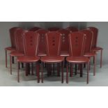 A set of modern red leather chairs by Quia, Italy, retailed by Harrods, c.2000, with pierced