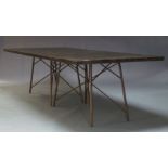 A large industrial 'Roman dining table 114', the rectangular metal clad top, with aged bronze effect