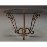 A French gilt metal occasional table, second half 20th century, with circular glass top on scrolling