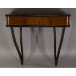 Italian, a walnut and ebonised wall mounted console table, c.1940, the rounded rectangular top