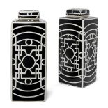 A pair of Art Deco pattern ceramic jars and covers, each of rectangular form, the monochrome