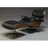 After Charles and Ray Eames, a '670' style lounge chair and '671' style ottoman, with tulipwood