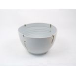 Mark Katzenellenbogen, a porcelain bowl with transparent glaze and silver metal overglaze, the