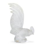 René Lalique (1860-1945), a clear and frosted glass paper-weight ‘Coq Nain’ No. 11-800, designed