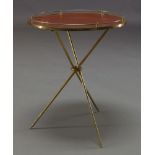 An Italian gilt metal side table, c.1950, with circular wood effect laminate top, on tripod legs,