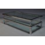 In the manner of Maison Jansen, a chromed and glass coffee table, c.1970, with rectangular sliding