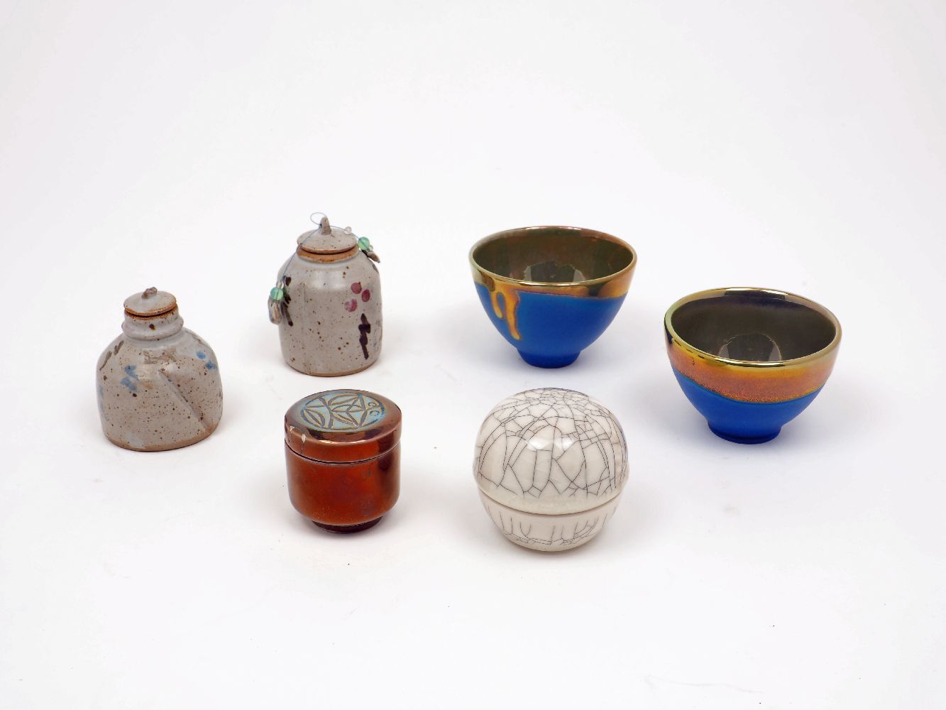 A selection of modern studio pottery of small proportions, comprising: two bowls by Margery Clinton,