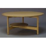 Ercol, an oak 'Svelto' coffee table, of recent manufacture, the circular top with circular