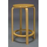 In the manner of Alvar Aalto, A bent plywood high stool, late 20th Century, with circular seat on
