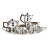 A four-piece silver tea set and tray, Birmingham, c.1960 and 1961, Elkington & Co., the teapot,