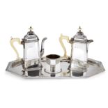 A matched Art Deco silver three piece café-au-lait set with silver tray, various dates and makers,