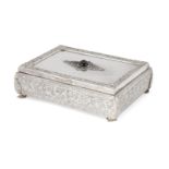 A decorative silver trinket box, stamped 800, the lid designed with central green cabochon stone