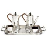 A four piece café-au-lait set with twin-handled silver tray, Sheffield, c.1931-1935, Walker &