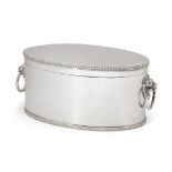 An oval silver biscuit box, Sheffield, 1928, Atkin Brothers, with applied lion mask ring handles