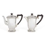 A silver café-au-lait pair, Birmingham, c.1947, Elkington & Co Ltd., both of cut-cornered oblong