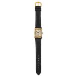 A 9ct gold wristwatch, the rectangular dial with Arabic numerals, alternate baton hour markers,